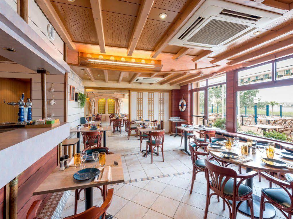 Logis Hotels - Au Poisson D'Argent - Hotel 3 Etoiles Et Restaurant Le Mesnil-en-Vallee Bagian luar foto